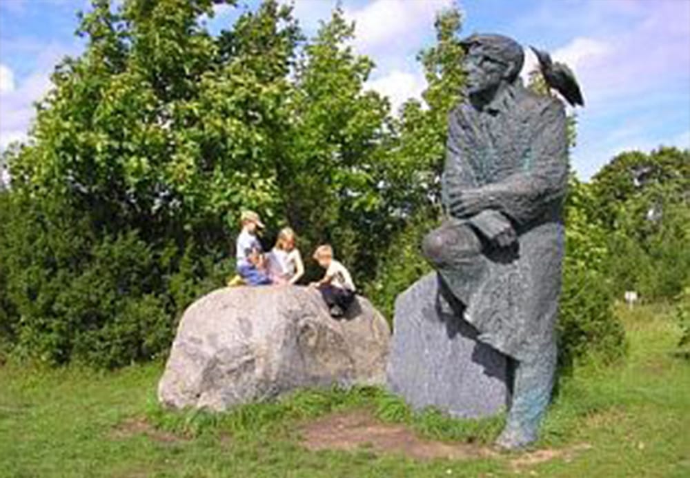 Visiting one of the local tourist attractions on the island - Juhan Smull monument